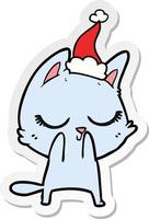 calm sticker cartoon of a cat wearing santa hat vector