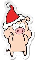 happy sticker cartoon of a pig wearing santa hat vector