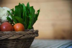 Fresh variety vegetable basket ready to be cooked in the kitchen - vegetable for making food background with copy space concept photo