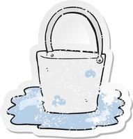 retro distressed sticker of a cartoon water bucket vector