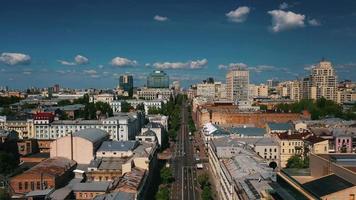 Rising aerial view of capital city Kyiv, Ukraine on blue sunny day video