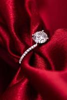 Diamond Wedding Ring Red Fabric photo