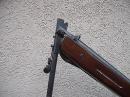 Folding air rifle for firing bullets photo