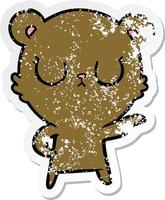 distressed sticker of a peaceful cartoon bear vector