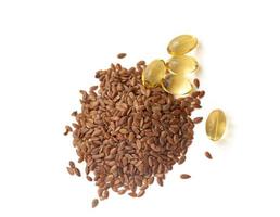 Linseed and fish oil on a white background photo