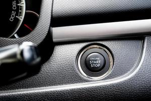View of push start or stop engine button. photo