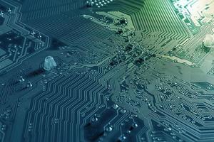 macro background of circuit board and microchip on mainboard pc desktop home use in bussiness photo