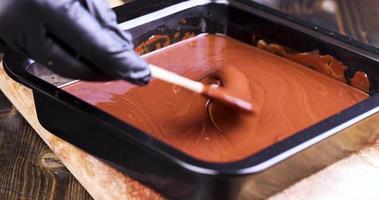 making chocolate from high-quality cocoa and cocoa butter with sugar photo