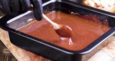 making chocolate from high-quality cocoa and cocoa butter with sugar photo