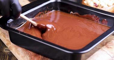 making chocolate from high-quality cocoa and cocoa butter with sugar photo