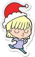 sticker cartoon of a woman wearing santa hat vector