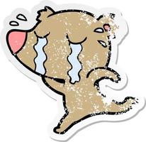 distressed sticker of a cartoon crying bear vector