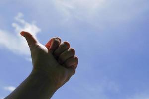 Left hand held on a celestial background photo