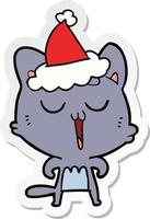 sticker cartoon of a cat singing wearing santa hat vector