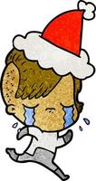 textured cartoon of a crying girl wearing space clothes wearing santa hat vector
