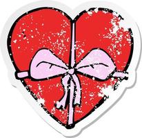 retro distressed sticker of a cartoon heart shaped present vector