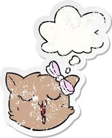 cartoon cat face and thought bubble as a distressed worn sticker vector