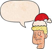 cartoon man wearing christmas hat and speech bubble in retro texture style vector