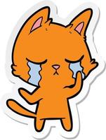 sticker of a crying cartoon cat vector