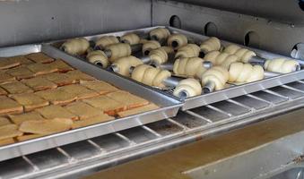 sheet with bread in oven photo