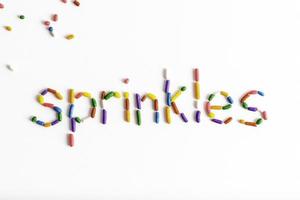 Rainbow Sprinkles on White Background photo