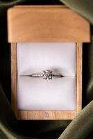 Diamond Wedding Ring Green Fabric photo