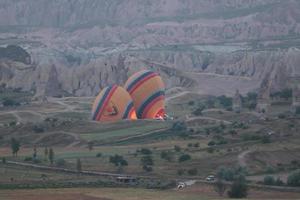 Hot Air Balloons in Cappadocia Valleys photo