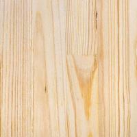 textured surface of solid wooden board from planks photo