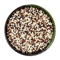 blend of quinoa grains in round bowl isolated photo