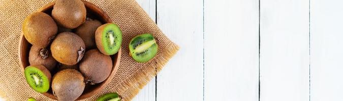 Juicy fresh kiwi fruit isolated on white background. Sliced kiwi photo