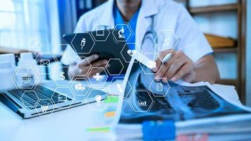 health care business graph data and growth, Medical examination and doctor analyzing medical report network connection on tablet screen. in virtual icon photo