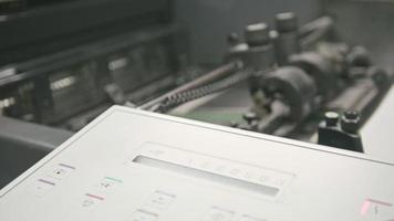View of details of the printing machine. control section. Polygraph industry video