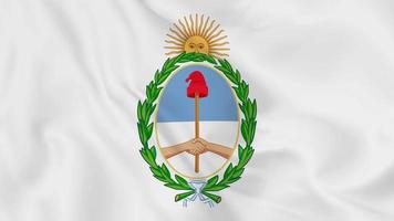 emblema nacional escudo de armas o símbolo de argentina en bandera ondeante. bucle suave de video 4k sin problemas