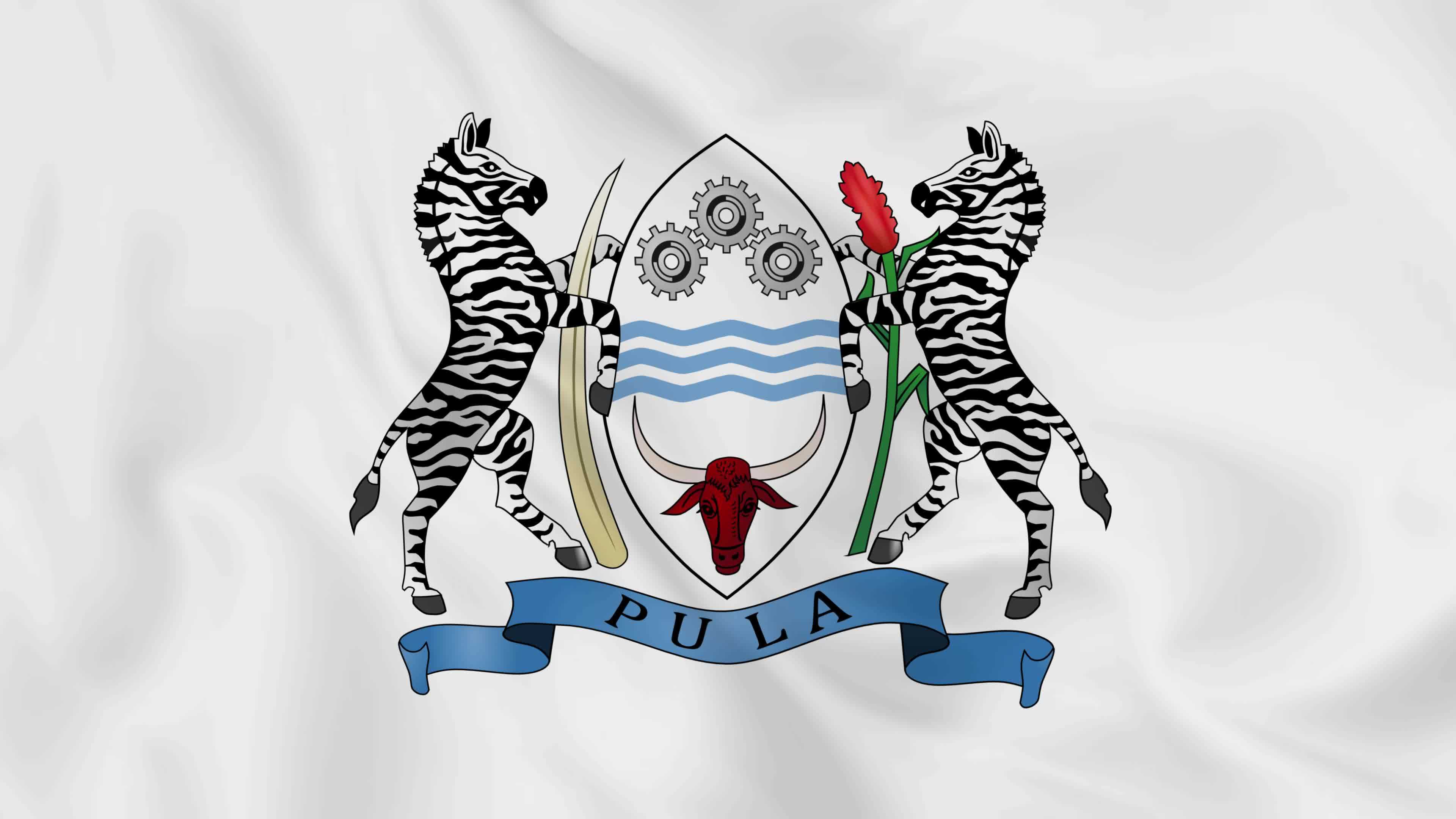 national emblem coat of arms or symbol of botswana in waving flag