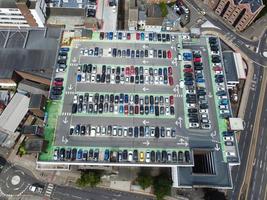 Aerial View of City Centre and Buildings at Luton Town of England from Central Railway Station of UK, Drone's High Angle Editorial Footage. photo