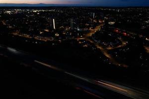 Beautiful Aerial High Angle View of British Motorways and Traffic at Luton Town of England UK at Night after Sunset photo