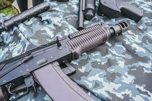 Machine gun with a clip on a military table photo