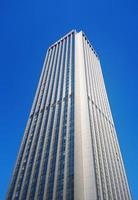 Beautiful high rise building in the blue sky photo