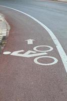 an image of a bike road sign and arrow photo