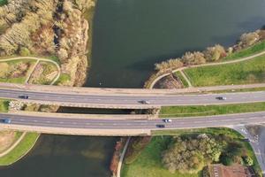 Gorgeous aerial footage and high angle view of British Lake and Roads with Water Birds photo