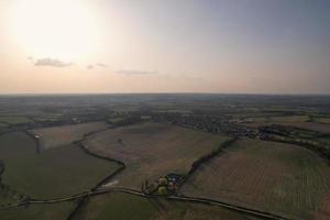 Gorgeous Aerial View of Luton City of England UK at Sunset Time, Colourful Clouds high angle footage taken by drone photo