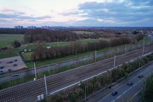 Gorgeous Aerial View of Luton City of England UK at Sunset Time, Colourful Clouds high angle footage taken by drone photo