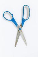 Scissors on white background photo