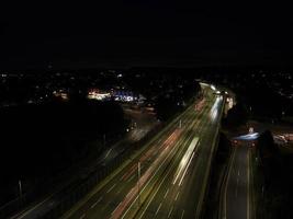 Beautiful Aerial High Angle View of British Motorways and Traffic at Luton Town of England UK at Night after Sunset photo