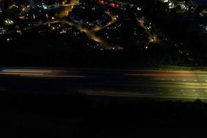 Beautiful Aerial High Angle View of British Motorways and Traffic at Luton Town of England UK at Night after Sunset photo