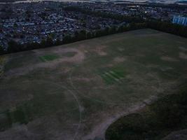 High angle aerial view of Luton City of England at Sunset Night. photo