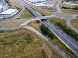 Aerial View and High Angle Footage of British Motorways Interchange of M1 Junction 11a at North Luton City of England UK. photo