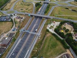 Aerial View and High Angle Footage of British Motorways Interchange of M1 Junction 11a at North Luton City of England UK. photo