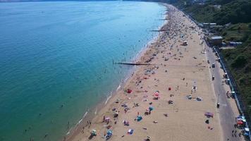 People relaxing at Bournemouth Beach of England UK photo