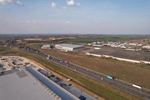 High Angle aerial view of British Roads and Traffic Passing through Luton City and countryside of England UK photo